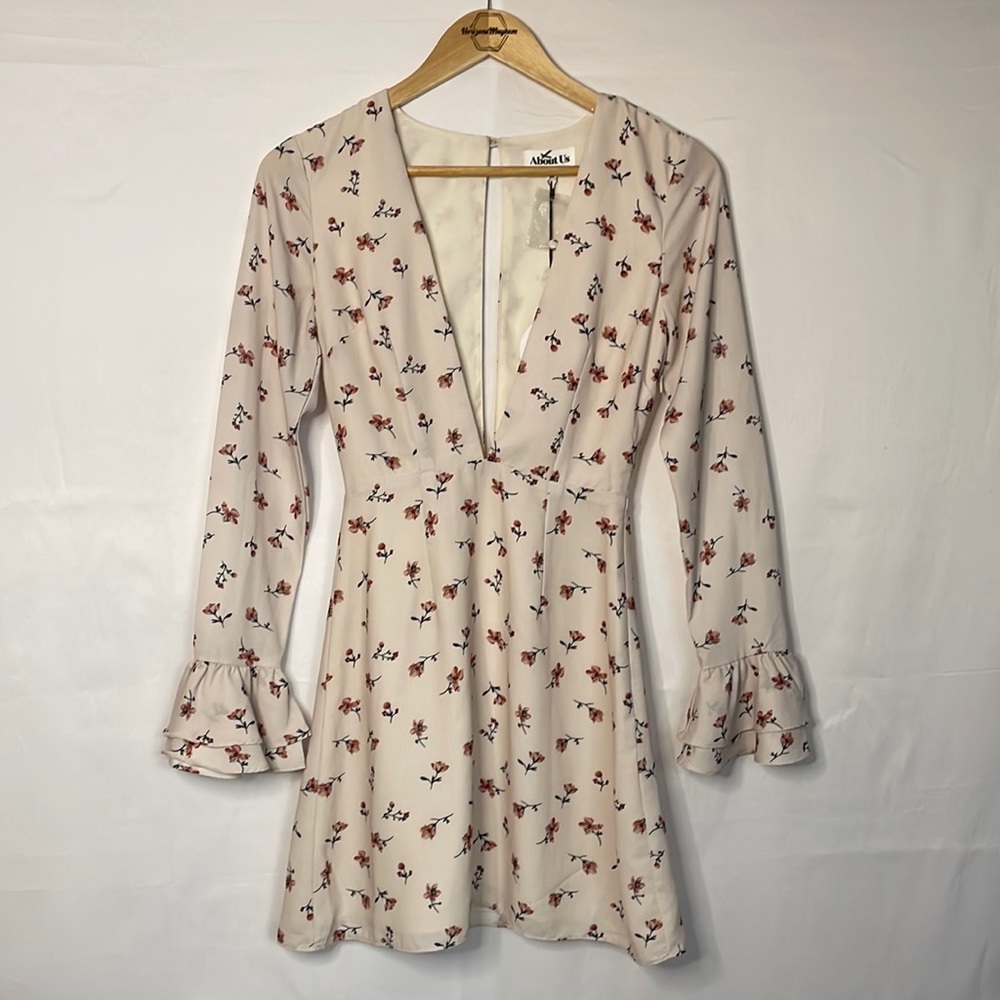 About Us - XXSmall Mini dress (cream color with Floral design)